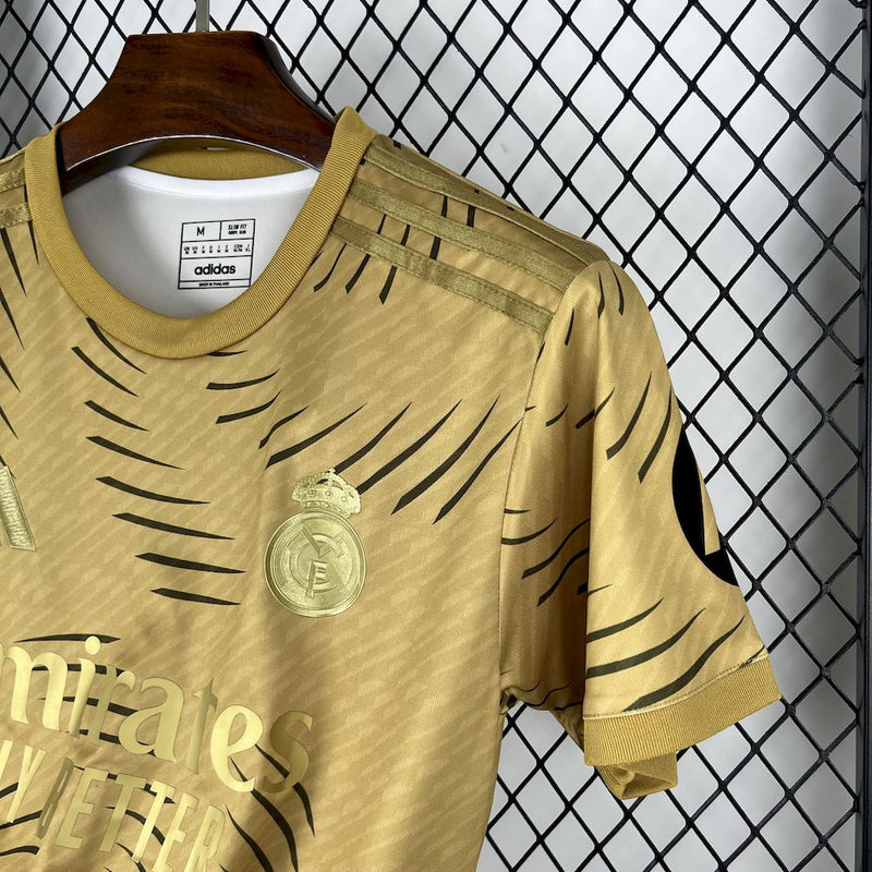 CAMISOLA DO REAL MADRID 25/26 DOURADO TREINO