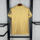 CAMISOLA DO REAL MADRID 25/26 DOURADO TREINO