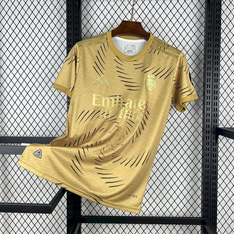 CAMISOLA DO REAL MADRID 25/26 DOURADO TREINO